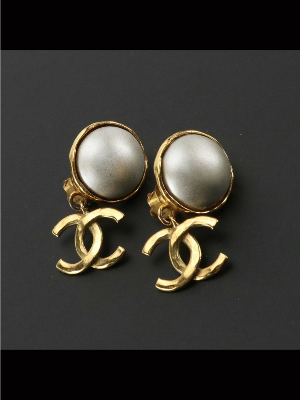 Vintage CHANEL 1990's  Gold Plated CC dangle drop statement clip-on earrings.